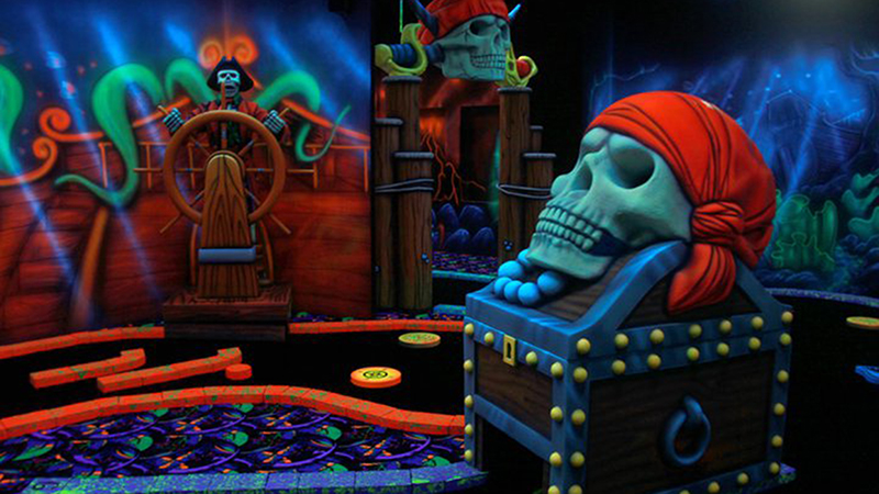 The glow-in-the dark pirate themed mini golf hole at Amazonia